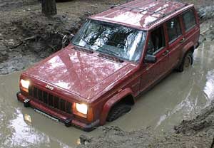 Peckfitz Fahrgel�nde - Jeep Cherokee XJ im Wasser